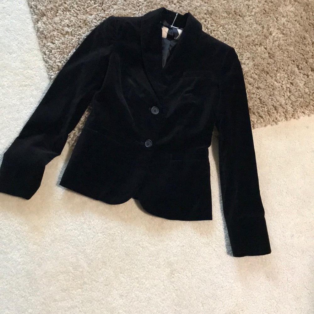 Black suit jacket with nipped waist